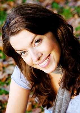 Smiling woman with porcelain veneers in Orange california