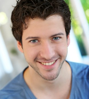 Man sharing flawless smile after root canal therapy and CEREC dental restoration