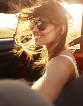 Woman with gorgeous smile after cosmetic dentistry in Orange California