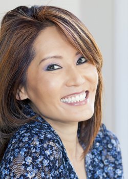 Woman smiling after gum disease treatment in Orange California