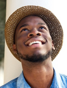 Man smilin after visiting his Orange California cosmetic dentist