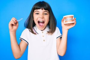 a child visiting their orthodontist for braces
