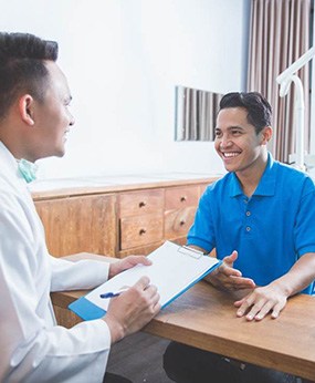 man asking about cost of a smile makeover