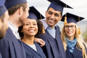 Students smiling at their graduation