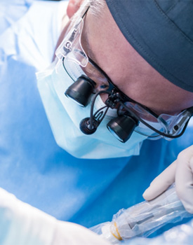 Closeup of implant dentist in Orange working