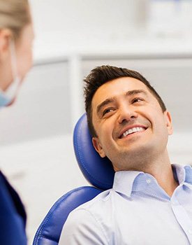 Man smiling in the dental chair