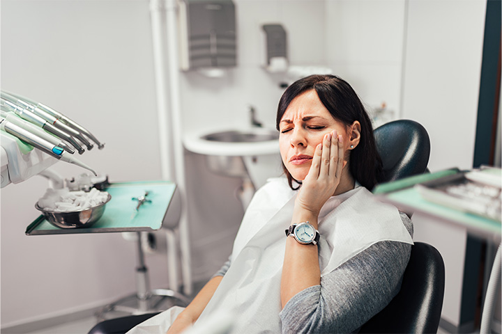 Woman with a toothache.